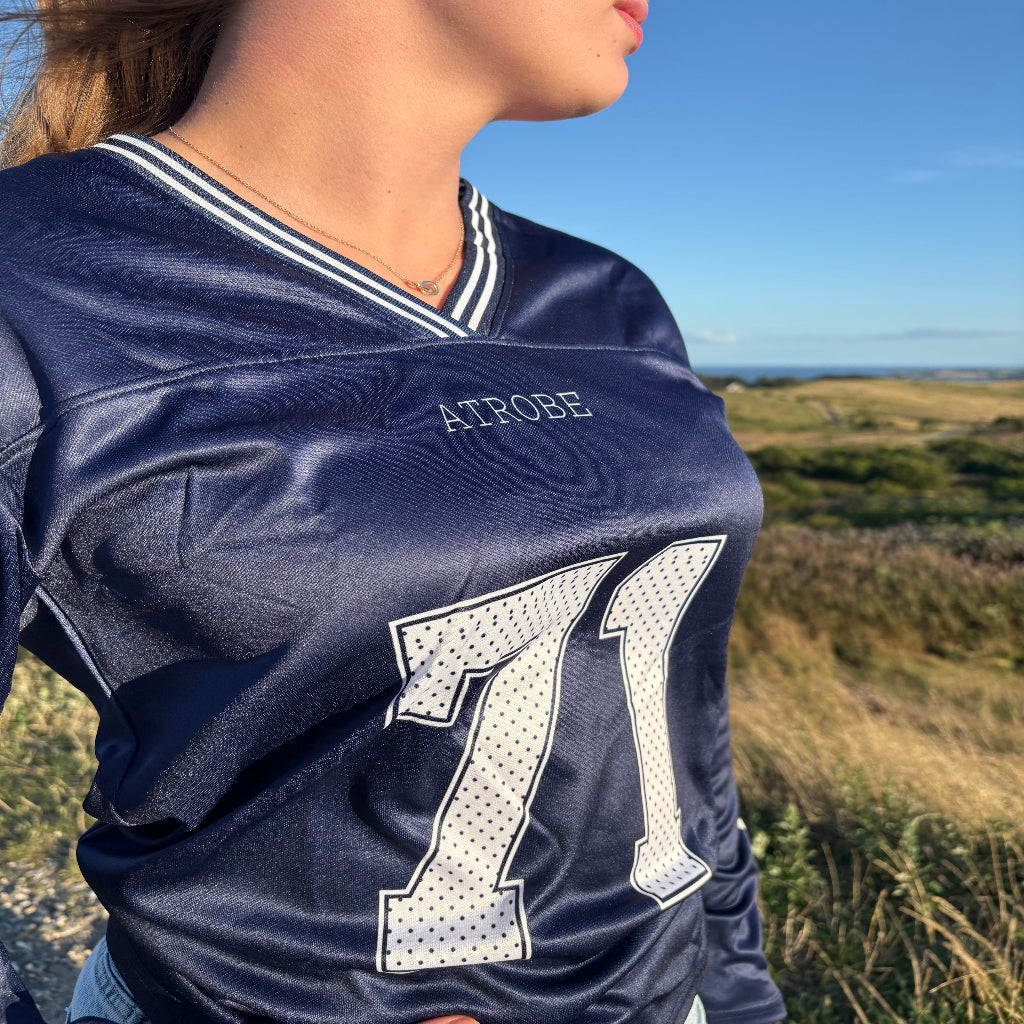 Close up voorkant atrobe field queen longsleeve
